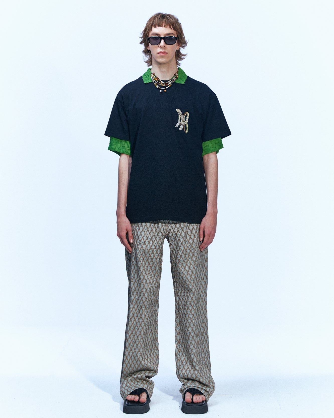 Andersson Bell MAKENI JACQUARD TRACK PANTS apa590m(BEIGE)
