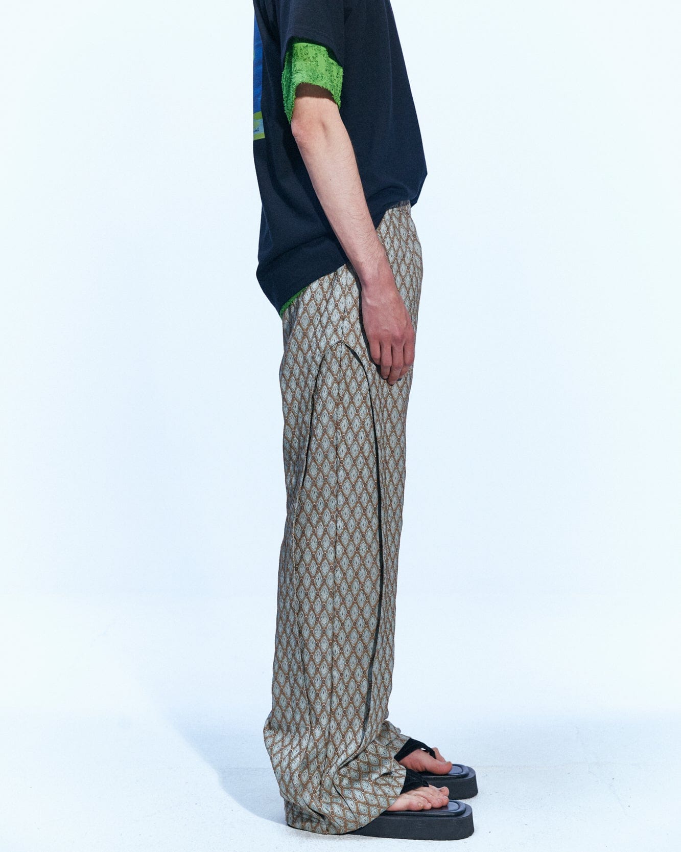 Andersson Bell MAKENI JACQUARD TRACK PANTS apa590m(BEIGE)
