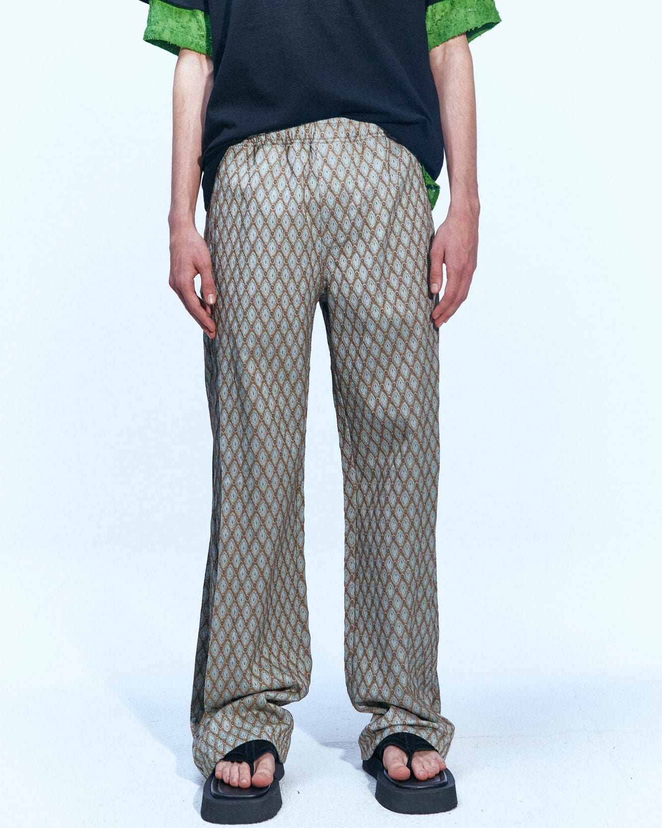 Andersson Bell MAKENI JACQUARD TRACK PANTS apa590m(BEIGE)
